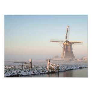 Windmill in a winter landscape photo print