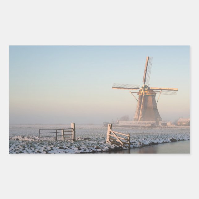 Windmill in the snow at sunrise rectangle sticker (Front)