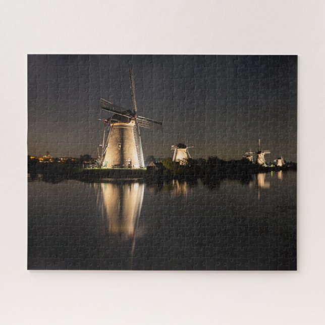 Windmills and water illuminated at night jigsaw puzzle (Horizontal)