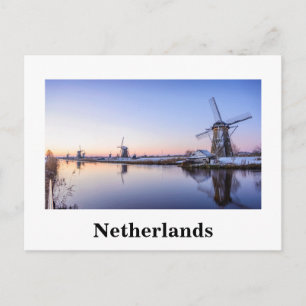 Windmills at sunrise in Holland white text card