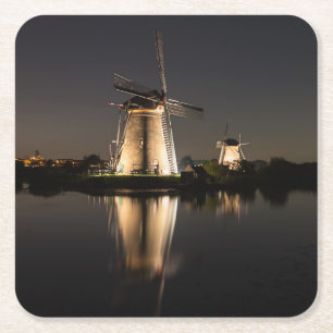 Windmills illuminated at night coaster