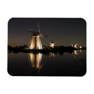 Windmills illuminated at night rectangle magnet