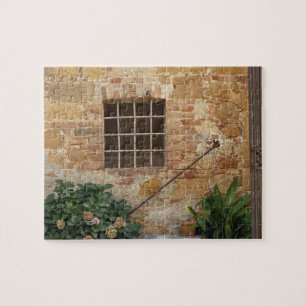 Window and ancient stone wall, Pienza, Italy Jigsaw Puzzle
