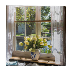 Window with lace curtain and tulips tile