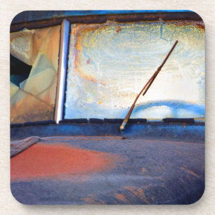 Windshield of an old rusty truck coaster