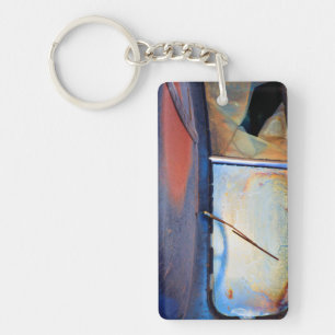 Windshield of an old rusty truck key ring