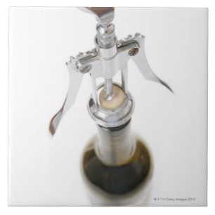 Wine bottle with corkscrew. tile