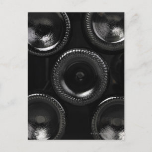 Wine bottles in a wine cellar. Only the bottom Postcard