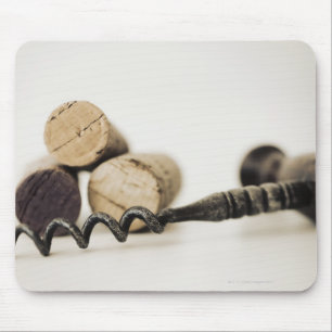 Wine corks with corkscrew mouse pad