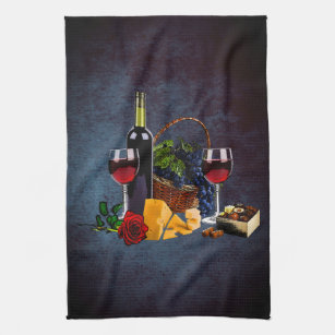 Wine glasses, bottle, grapes, cheese, chocolates N Tea Towel