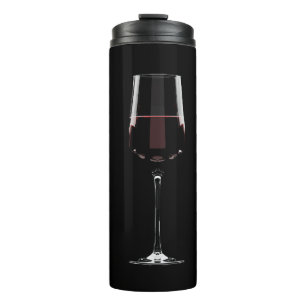 Wine glasses with red wine on black thermal tumbler