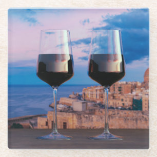 Wine glasses with view of sunset over Valletta Glass Coaster