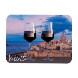 Wine glasses with view of sunset over Valletta Magnet