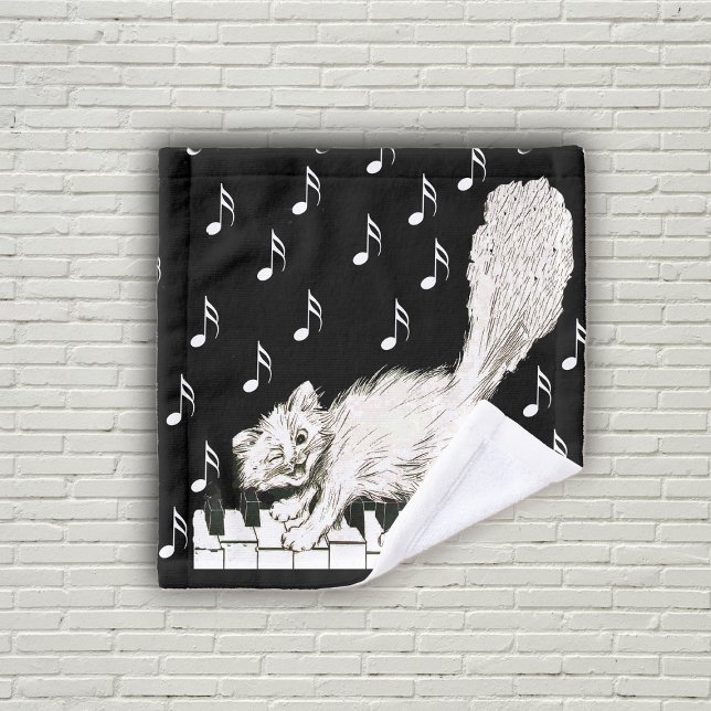 Winking Fluffy White Cat Walking on Piano Keys Wash Cloth (White winking cat walking on piano keys music notes on black bath washcloth.)