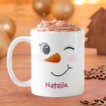 Winking Snowman Personalised Mug for Kids<br><div class="desc">Add a playful touch to the holidays with this winking snowman face mug, customised with a name for extra cheer! Featuring rosy cheeks, a carrot nose, and a big wink, this adorable cup is perfect for sipping cocoa on snowy mornings. A fun Christmas gift for kids, grandkids, or snowman lovers...</div>