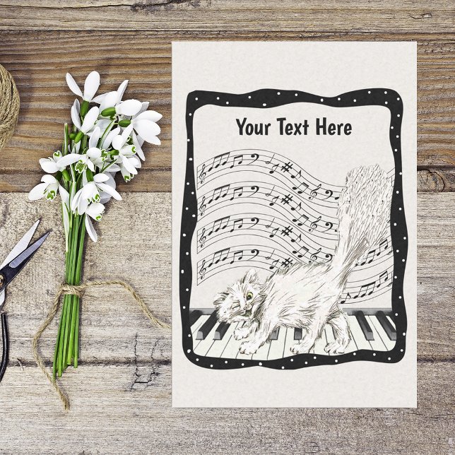 Winking White Cat Dancing on Piano Black Frame Tissue Paper (Smiling white cat on piano keys in black frame bars of music notes on black and white tissue paper.)