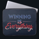 Winning Is Everything  Laptop Sleeve<br><div class="desc">A vibrant and dynamic graphic design featuring the phrase "Winning Is Everything" in bold, contrasting red, white, and blue lettering. The colours are arranged in a striking and eye-catching pattern, creating a sense of energy and excitement. The design is abstract and modern, with a focus on the typography and its...</div>