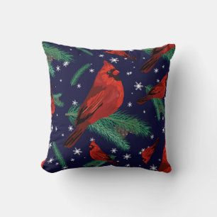 Winter birds - cardinals on fir-tree branches with cushion