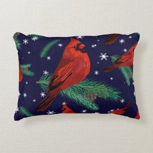 Winter birds - cardinals on fir-tree branches with decorative cushion