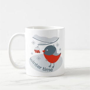 Winter bullfinch bird and red rowan berries coffee mug