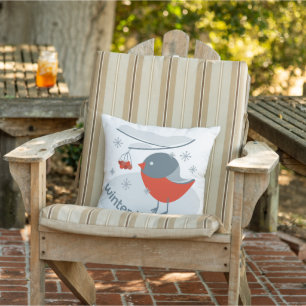 Winter bullfinch bird and red rowan berries cushion