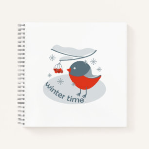 Winter bullfinch bird and red rowan berries notebook