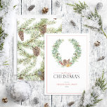 Winter Fir Cone Berry Wreath Merry Christmas Holid Holiday Card<br><div class="desc">Looking for a beautiful, simple, and elegant holiday card? Look no further than our Festive Winter Fir Cone Berry Wreath Merry Christmas Script Holiday Card! This stunning card features a modern and winter greenery wreath beautifully decorated with watercolor artwork of winter fir cones and red berries, with the 'Merry Christmas'...</div>