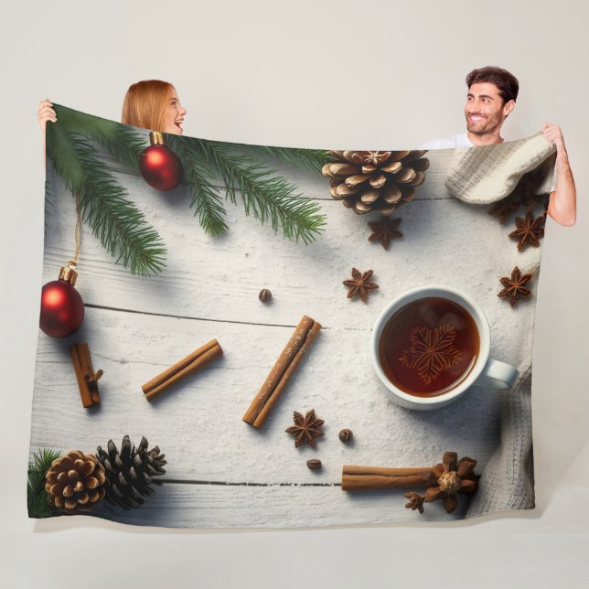 winter flat-lay composition, a steaming cup  fleece blanket (In Situ)