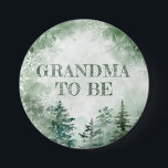 Winter forest grandma to be baby shower 7.5 cm round badge<br><div class="desc">Winter forest mummy to be baby shower button. Celebrate the excited grandma-to-be with this charming button. Featuring a winter forest motif, it adds a touch of enchantment to the baby shower. Let the magic of the winter season and the joy of becoming a grandma fill the air as you honour...</div>