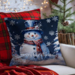 Winter Forest Snowman Christmas | Blue Cushion<br><div class="desc">Bring joy and whimsy to your seasonal decor with this charming Blue Winter Forest Holiday Throw Pillow. Featuring a smiling snowman dressed in a classic top hat and cosy scarf, the design captures the magic of a wintry scene with softly falling snow and delicate white snowflakes. Nestled among frosted trees,...</div>