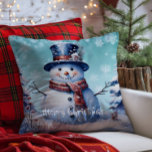 Winter Forest Snowman Christmas | Teal Cushion<br><div class="desc">Bring joy and whimsy to your seasonal decor with this charming Teal Winter Forest Holiday Throw Pillow. Featuring a smiling snowman dressed in a classic top hat and cosy scarf, the design captures the magic of a wintry scene with softly falling snow and delicate white snowflakes. Nestled among frosted trees,...</div>