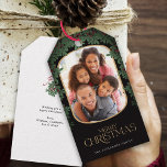 Winter Greenery Mistletoe Rounded Photo Christmas Gift Tags<br><div class="desc">This delightful Christmas gift tag showcases a vertical photo within a modern rounded frame,  accented with a mistletoe border. This black gift tag offers space for your favourite picture. Custom text,  on the backside,  allows you to add your own personal message,  or use the one shown.</div>