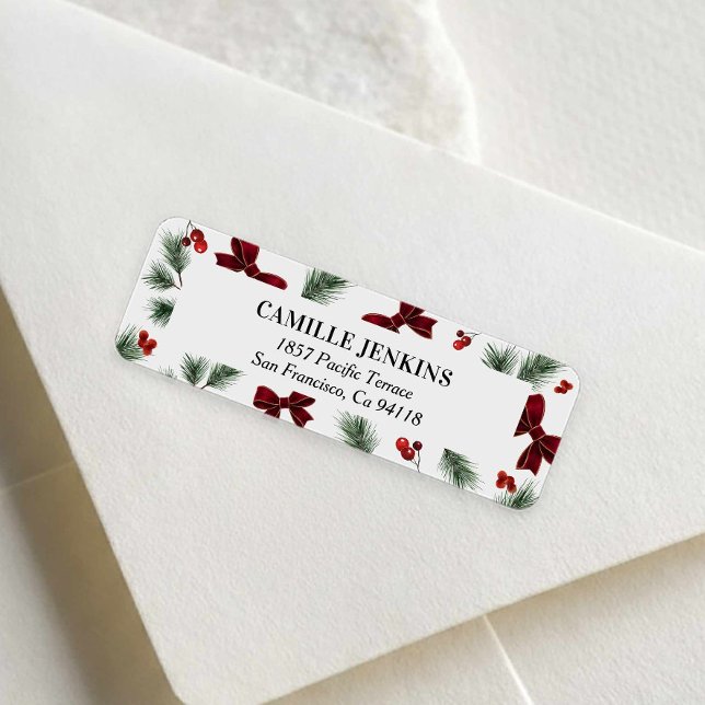 Winter Greenery Red Bow Return Address Label (Red Bow and Winter Greenery Christmas Theme Return Address Label)