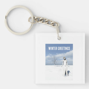 Winter Greetings. Female elf walking in the snow  Key Ring