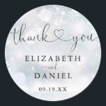 Winter Heart Script Thank You Wedding Favour Classic Round Sticker<br><div class="desc">Elegant winter snowflakes heart script thank you sticker personalised with your names and special date. Designed by Thisisnotme©</div>
