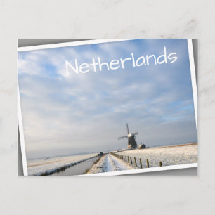Winter landscape with snow and windmill in Holland Postcard