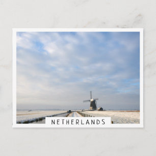 Winter landscape with snow and windmill in Holland Postcard