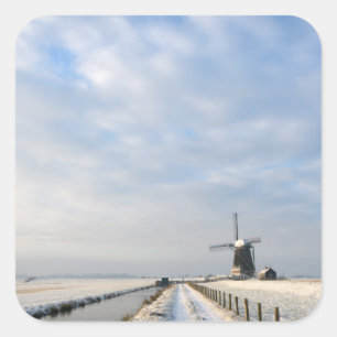 Winter landscape with snow and windmill in Holland Square Sticker