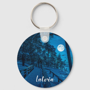 Winter landscape with snow covered pine forest key ring