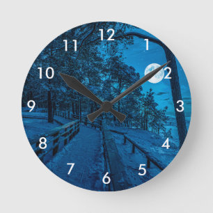 Winter landscape with snow covered pine forest round clock
