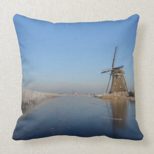 Winter landscape with windmill and ice cushion