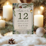 Winter Rustic Pine Chic Botanical Lantern Wedding Table Number<br><div class="desc">Winter Rustic Pine Trees Botanical Lantern Wedding Table Number. Beautiful elegant winter wedding table numbers with snowy lantern with rustic botanical pine branches and pine trees . This custom modern wedding design can easily be personalised with your own wedding details.</div>