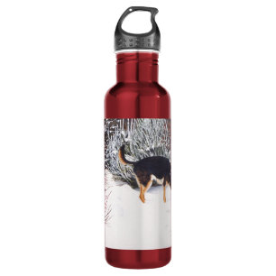 Winter snow scene with cute black and tan dog 710 ml water bottle