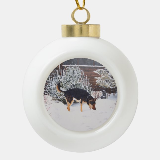 Winter snow scene with cute black and tan dog ceramic ball christmas ornament (Front)
