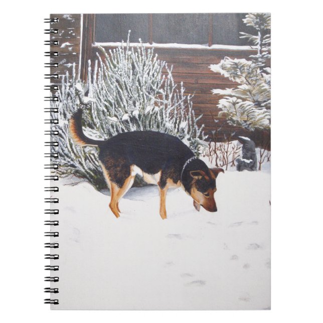 Winter snow scene with cute black and tan dog notebook (Front)