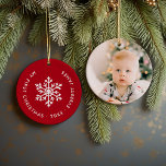 Winter Snowflake First Christmas Keepsake Photo Ceramic Ornament<br><div class="desc">Ceramic holiday ornament personalised with your baby's photo and custom "My First Christmas" text. This simple modern holiday design features a white snowflake on a festive red background. Use the design tools to choose any background colour, edit text fonts and colours and add your own photos to create your own...</div>