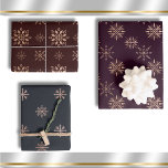 Winter Snowflakes Modern Elegant Patterns Wrapping Paper Sheet<br><div class="desc">These winter or Christmas wrapping paper sheets have three different watercolor,  snowflake patterns in elegant rose gold on a red or black background. Perfect for holiday gift wrap,  winter birthdays,  or any other seasonal occasion,  family and friends will love these modern designs.</div>