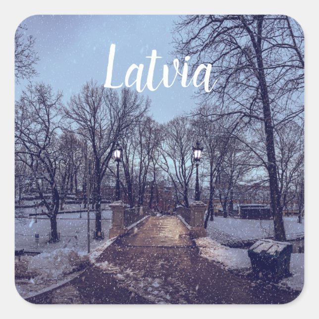 Winter snowy city park in the evening square sticker (Front)