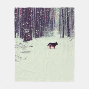 Winter snowy pine forest, dog walking in the fores fleece blanket