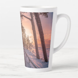 Winter sunset in pine forest near sea latte mug